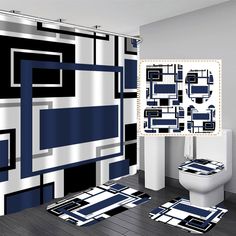 a bathroom with blue and white decor on the shower curtain, toilet and rugs