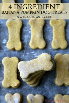 dog treats are lined up on a cookie sheet