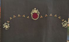 an old black cloth with gold and red designs on it