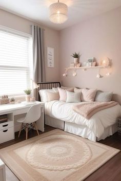 a bedroom with pink walls, white furniture and rugs on the hardwood flooring