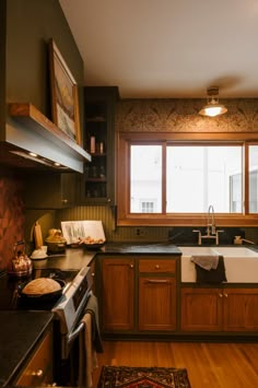 the kitchen is clean and ready for us to use in its new owner's home