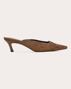 An architectural take on traditional mules, Logan pairs its snipped toe with an angled kitten heel. The genuine suede upper is cast in a neutral brown hue for maximum styling potential. Slip-on Snipped toe Angled kitten heel Upper: 100% suede Lining: 100% leather Sock: 100% leather Outsole: 100% leather Spot clean Handmade in Brazil Size & Fit Heel height: 1.96in (50mm) This style runs small. We recommend ordering a half size up. Brown Kid, Flora Dress, Crepe Midi Dress, Suede High Heels, Cherry Dress, Suede Mules, Leather Socks, Crepe Fabric, Kitten Heel