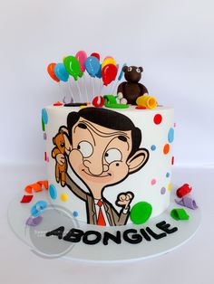 a birthday cake with a cartoon character on it