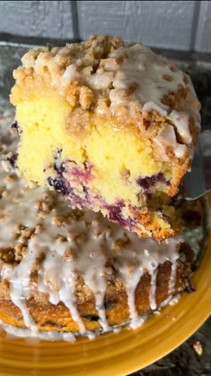 a close up of a piece of cake on a plate with a fork in it