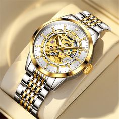 Specifications:

• Item Type: Mechanical Wristwatch

• Style:  Fashion & Casual,Classic,Luxury,Business,Casual

• Band Length: 20cm

• Movement: Automatic Self-Wind

• Case Material: Stainless Steel

• Case Thickness: 12mm

• Band Material Type: Stainless Steel

• Dial Diameter: 44mm

• Band Width: 24mm

• Case Shape: Round

• Feature: Luminous,Water-Resistant,Skeleton

Package Included:

1 x OLEVS Watch

1 x Original box

1 x Warranty card 

1 x Instruction manual 

1 x Adjustment tools Timeless Watches, Hand Wrist, Gold Watch Men, Luxury Diamonds, Stylish Watches, Watch Gifts