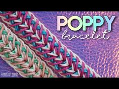 a close up view of some colorful crocheted material with the words poppy basket on it