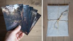 a hand holding four photos next to an envelope tied up with twine and string