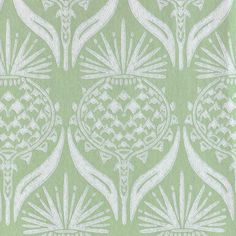 a green and white wallpaper with an intricate design on it's side,