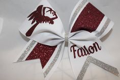 Cheer Bow made with your lettering, ribbon color and 2 glitter colors. Nice sturdy stiffened bows that will last all season! Guaranteed, for current season, even if elastic breaks send back and I will fix it! This bow is already priced for team orders. I cannot discount this bow except for large orders (75+). In MANY cases (not all) I will accept school purchase orders. There will be an additional fee for doing this. Bows will need to be shipped to the school in care of principal, etc. Contact m Cheer Bows Diy, High School Cheer, Types Of Bows, Hair Bow Tutorial, Cheer Coaches, Cheer Uniform, Glitter Colors, Bows Diy, Bow Tutorial