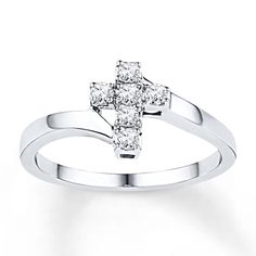 This lovely cross ring for her is fashioned in sterling silver with round diamonds. The ring has a total diamond weight of 1/5 carat. Purity Ring, Casual Rings, Jewelry Advice, Diamond Cross, Cross Ring, The Ring, Rings For Her, Vintage Diamond, Unique Engagement Rings