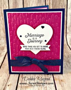 a card that says marriage is a journey, and has a heart on the front