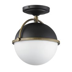 a black and white light fixture on a white background with an open bulb in the center