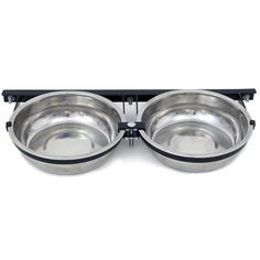 two stainless steel bowls with black rims on each side and one bowl is empty