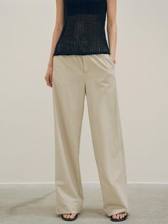 This is a refined and minimal pants by Siyazu that is made out of high quality and sturdy material. With classic mood of the design and feminine look, you can style it for your refined and casual daily outfit. - Fake pockets on the back- High quality lycra elastic waistband- Normal wide silhouette Chic Beige Chinos For Work, Beige Wide Leg Ankle-length Pants For Business Casual, Beige Ankle-length Wide Leg Pants For Business Casual, Classic Beige Wide-leg Dress Pants, Beige Straight Chinos For Business Casual, Beige Wide-leg Pants For Business Casual, Beige Ankle-length Chinos For Work, Taupe Straight Leg Pants For Work, Elegant Straight Leg Khaki Pants