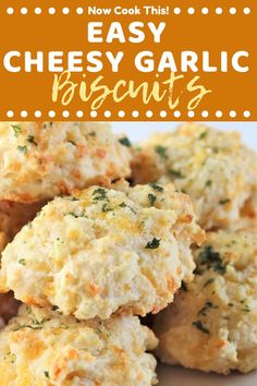 cheesy garlic biscuits on a plate with text overlay