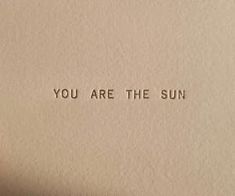 an old typewriter with the words you are the sun printed on it's side