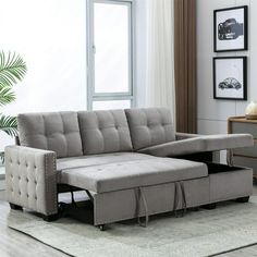 a living room scene with focus on the sectional sofa and pull out bed in the middle