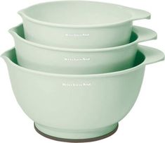 three green mixing bowls stacked on top of each other