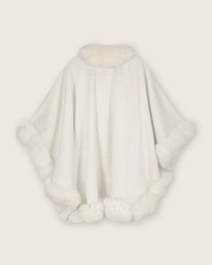 Our best-selling Cervinia cashmere cape is crafted with pure Mongolian cashmere and trimmed with real Finland fur. Featured on The Bachelorette with its glamorous silhouette, it's no wonder the Cervinia remains a customer favorite. 100% Mongolian cashmere Trimmed with dyed-to-match Finland fur. Elegant Sheepskin Fur Coat With Faux Fur Trim, Elegant Fur Cape Coat With Faux Fur Trim, Elegant Cape Fur Coat With Faux Fur Trim, Elegant Cape-style Fur Coat With Faux Fur Lining, Elegant Fur Coat With Faux Fur Trim Cape, Elegant Faux Fur Cape With Lining, Elegant Fur Cape Coat For Fall, Elegant Cape With Faux Fur Lining, Elegant Cape With Faux Fur