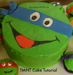 a teenage mutant ninja turtle cake with cupcakes