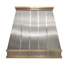 a stainless steel and wood stove hood on an isolated white background