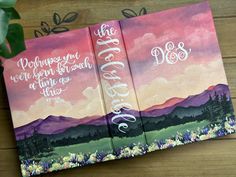 three book covers with hand lettering on them