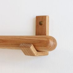 a close up of a wooden object on a wall