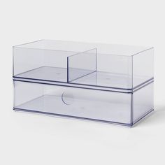 two clear boxes with lids on each side