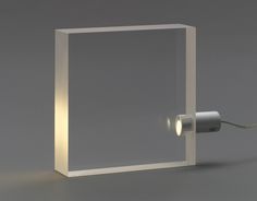 a white square light with a cord attached to it