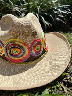 Hola and thank you for being part of our dream!  Here is very useful information before your purchase, but if you have any questions, do not hesitate to send us a message! Beautiful and colorful hats for women Handmade designed by Colombian artisan hands. It is exactly as shown in the pictures (It does include the decor on top) *SIZING* Size 3: 53-54cm Size 4: 55-56cm Size 5: 57-58cm Size 6: 59 +cm Please refer to the size measurement chart before ordering. You can find the measurement chart in the photos of our listing (all the way at the top). You will also find a guide that shows you how to take the correct measures. If you need additional photos or info to help you decide please message us! *GARMENT CARE* -Be sure to use only a damp cloth. A soaking wet cloth or sponge can cause water Handmade Toquilla Straw Fedora With Curved Brim, Handmade Toquilla Straw Panama Hat With Curved Brim, Multicolor Hat Bands For Beach In Spring, Handmade Fedora Panama Hat In Toquilla Straw, Whimsical Adjustable Beach Hat, Whimsical Beach Hat, Handmade Wide Brim Panama Hat In Toquilla Straw, Handmade Wide Brim Toquilla Straw Fedora, Handmade Wide Brim Fedora In Toquilla Straw