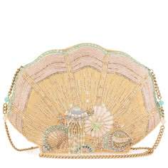 Mary Frances Ebb & Flow Sea Shell  Crossbody This beaded shell-shaped handbag in soft pastel hues adorned with sparkling treasures is a seaside soiree of beadwork. It's a splash of mermaid magic for any outfit. Dimensions: 10.75 x 1.25 x 7", Strap length - 48", Strap drop - 22", Removable crossbody chain strap, Magnet closure, Back slip & inside slip pocket, Gold lining, Fits a cell phone THIS IS A HANDMADE ITEM, EACH ONE AN INDIVIDUAL WORK OF ART. SLIGHT VARIATIONS MAY OCCUR. I am a authorized Ysl Hobo, Black Birkin, Mary Frances Handbags, Summer Handbag, Mermaid Magic, Mary Frances, Dream Bags, Dressed To The Nines, Construction Vehicles