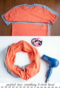 an orange shirt, scarf and hair dryer sitting on top of a table