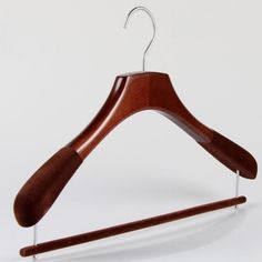 a wooden hanger on a white background