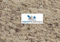 a granite counter top with a business card in the center and logo for sonante tile & stone co on it