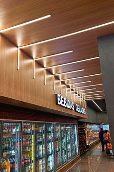 the interior of a grocery store with vending machines