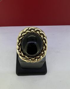 Add a touch of elegance to your style with this stunning Dian Malouf ring. Crafted from high-quality sterling silver and 14k gold, this ring features a beautiful black onyx gemstone that adds a touch of sophistication to any outfit. The ring is also sizable, making it a perfect gift for someone special or to treat yourself. This ring is perfect for any occasion, whether it's a formal event or just a night out. The black onyx gemstone adds a touch of class to the ring, while the 14k gold and 925 metal purity ensure its durability. With its unique design and high-quality materials, this ring is sure to become a staple in your jewelry collection. Dian Malouf, Onyx Gemstone, Ring Pictures, 14k Gold Ring, Black Onyx, Formal Event, Onyx, Unique Design, Gold Rings