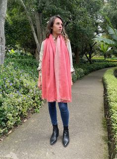 There is no feeling like the softness of alpaca wool against the skin. This reversible Fancy Alpaca shawl with pink and white tones will keep you cozy and looking stylish all day long whether in your cool office or running errands around town. Our luxurious shawls are sure to become your go to fashion accessory. 70% alpaca & 30% acrylic Dimensions:  Length: 85 in (including fringe) Width: 25 in Benefits Of Fancy Alpaca Shawls ♥ The durability of the alpaca wool means your Fancy Alpaca shawl will remain a cherished item of your wardrobe for many years to come.  ♥ Easy to care for: don't worry your alpaca shawl is easy to care for to keep its pristine appearance. It is always recommendable to hand wash your alpaca shawl with a mild soap, but if you decide to machine wash do so carefully on a Alpaca Shawl, Alpaca Gifts, Wedding Shawl, Alpaca Wool, Bridal Gifts, Shawls And Wraps, Running Errands, Evening Wear, Alpaca