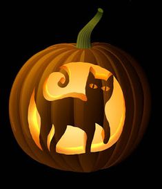 a pumpkin with a cat carved into it