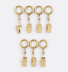 six pairs of gold - plated metal clasps and rings