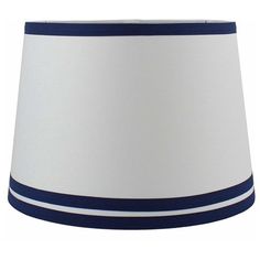 a white and blue lamp shade with stripes on it's bottom, against a white background