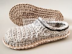 a pair of crocheted slippers on top of each other