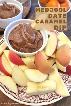 a plate topped with apples and caramel dip next to bowls of fruit on a table