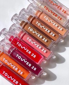 Indulge in luscious, hydrating color with Tower 28's ShineOn Milky Lip Jelly. Innovative formula combines the richness of a lip balm with the shine of a gloss, leaving your lips feeling soft, plump, and oh-so-kissable. With a range of flattering shades to choose from, you'll find the perfect match for any occasion. Treat your lips to a touch of luxury and shine bright with Tower 28 Beauty. #LipJelly #HydratingBeauty #ShineOn Tower 28, Vegan Lip Gloss, Lip Jelly, Makeup Bag Essentials, Sephora Skin Care, Raspberry Seeds, Raspberry Seed Oil, Skin Care Items