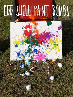 an egg shell paint bomb sits on the ground in front of a box with eggs