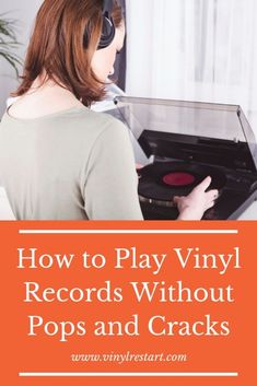 a woman with headphones on playing vinyl records without pops and cracks in an old record player