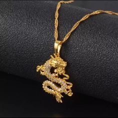 Unisex For Men And Women! 18k Gold Plated Dragon Necklace. Will Not Tarnish Or Change Color . Comes With Thin Wave Chain . Choose 16, 18 Or 23inch . Product Details + Care - Gold Plated Over Brass - Brass: Copper + Zinc Alloy - Wipe Clean - Imported Dimensions - Pendant: 22 Mm X 34 Mm Fantasy Necklace, Silver Dragon Necklace, Gold Dragon, Dragon Necklace, Dragon Jewelry, Dope Jewelry, Silver Dragon, Dragon Pendant, Charm Pendant Necklace