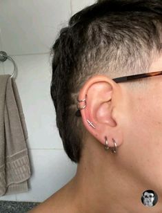 a man with ear piercings on his ears