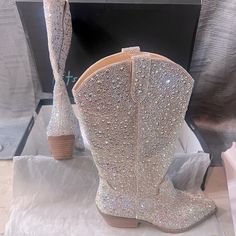 Brand New With Box Betsey Johnson Sb-Dalas Champagne Colored Rhinestone Leather Cowgirl Boots. Comes With Extra Replacement Rhinestones As Well. Never Worn & Come With Box As Well. Will Not Accept Anything Lower Then Listed Price. These Were Almost $300 And Have Never Been Worn And Are In Perfect Condition. The Price Is A Steal! Beautiful Rhinestones, Shiny And Will Most Certainly Get You Noticed. Betsey Johnson Sparkle Boots Outfit, Betty Johnson Rhinestone Boots, Katyannatwo Rhinestone Embellished Over-the-knee Western Dress Boots, Betsey Johnson Cady Boots, Betsy Johnson Sparkle Boots, Silver Slippers, Concert Wear, Leather Cowgirl Boots, Sequin Boots