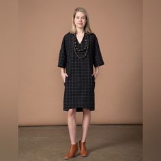 I Am Selling This Nwt Sbj Austin Sadie Dress In A Size 1 (Equivalent To A Size 2-4). I Listed As Size Small. Deep V-Neck, Fabric Waist Tie, Longer In The Back, Slim Though The Hip, Wide Sleeves Look Great As Is Or Rolled Up. Feel Free To Use The Fabric Tie Or Just Leave It As Is. The Drape Across The Back Is Very Flattering. Pockets On Both Hip Sides 100% Cotton Made In Usa Same Day Shipping! Sadies Dress, Wide Sleeves, Waist Tie, Black & White, Austin, Looks Great, Midi Dress, V Neck, Womens Dresses