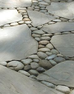 the rocks are arranged in a circle on the ground, and they look like they have been made out of stones